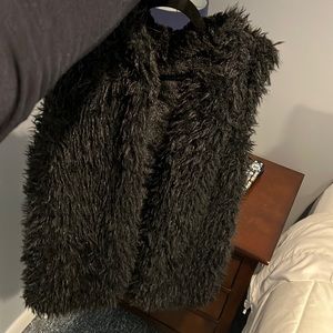 Faux fur vest with hood